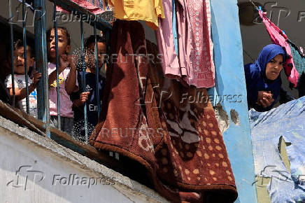 Displaced Palestinians shelter in a UNRWA school, in Khan Younis