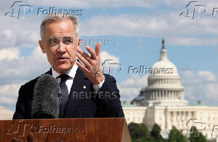 FILE PHOTO: Canadian Prime Minister Carney holds a press conference in Washington