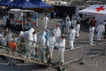 Rescued migrants disembark Sea-Watch 5 ship in Salerno