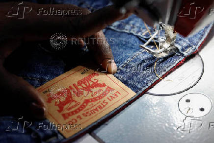 Kenyan workers prepare clothes for export at the United Aryan EPZ factory in Ruaraka district of Nairobi