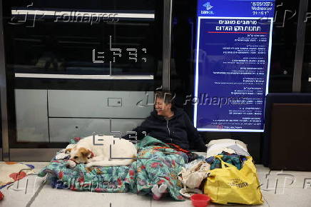 People shelter at Tel Aviv Light Rail Station amid ongoing Iranian ballistic missile threat