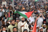 Supporters of Islamic organization Jamiat Ulema-e-Islam rally in Lahore in solidarity with Palestinians