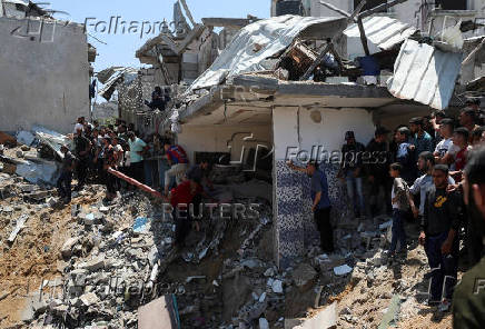 Aftermath of an Israeli strike on a house, in Jabalia
