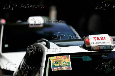 French taxi drivers protest near the Bercy Economy and Finance Ministry Paris