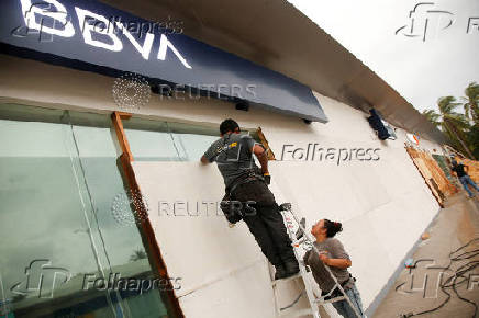 FILE PHOTO: Hurricane Erick strengthens off Mexico's Pacific Coast, in Puerto Escondido