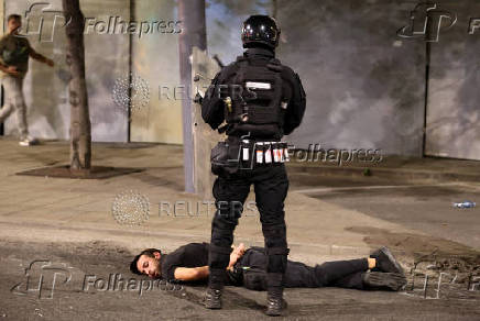 Serbia's police intervene to end standoff between ruling party supporters and anti-government protesters in Belgrade