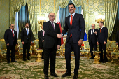 Russia's President Vladimir Putin meets Qatar's Emir Tamim bin Hamad Al Thani in Moscow