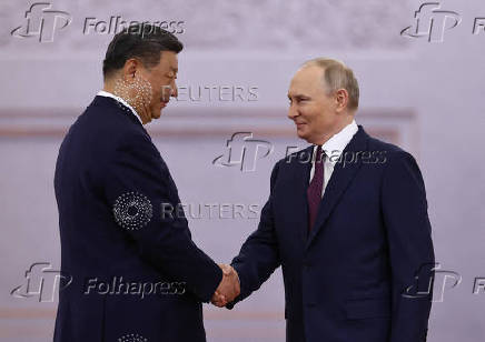 Russian President Putin and Chinese President Xi meet in Moscow