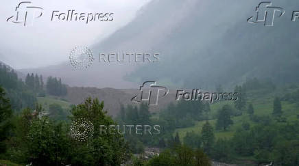 Mud and rock bury Swiss village after glacier collapse