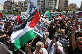 Demonstrators gather during a protest against hunger crisis in Gaza, near the embassy of Egypt in Beirut