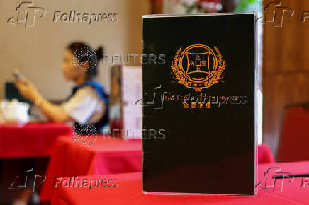 A menu sits on a table at Jing Fong in Chinatown in New York
