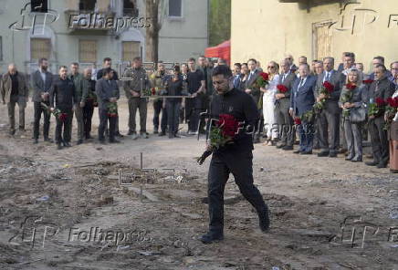 Ukrainian President Zelensky visits site of Russian missile strike in Kyiv