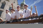 Newly graduated students celebrate end of high school in the streets of Copenhagen