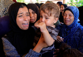 Funeral of Palestinians killed overnight in Israeli attacks, in Khan Younis