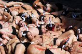 Protesters demonstrate for the permanent end of bullfighting and running of the bulls, a day before the start of the the San Fermin festival, in Pamplona