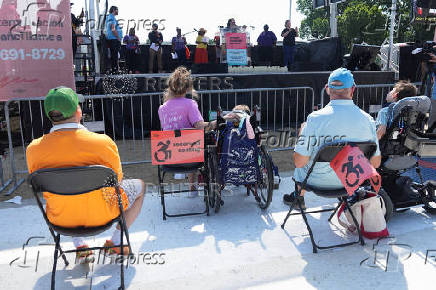 Demonstrators hold a four-day vigil in protest of cuts to Medicaid, in Washington