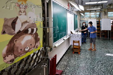Voters cast their ballots in recall election for several Taiwanese legislators