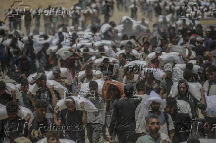 Aid enters Gaza Strip after Israel announces daily pause of hostilities