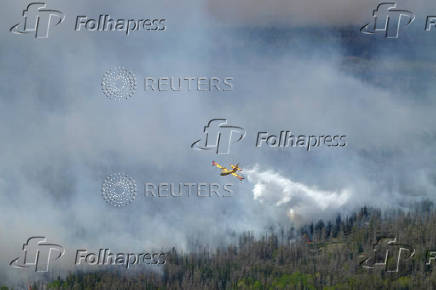 Smoke rises from the Nopiming Provincial Park wildfire EA061 east of Bird River
