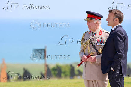 FILE PHOTO: Britain commemorates D-Day 80th anniversary at Normandy Memorial