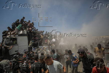 Aid enters Gaza Strip after Israel announces daily pause of hostilities