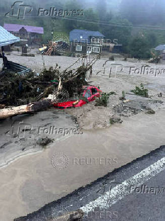 Floods strike the town of Brosteni in Romania