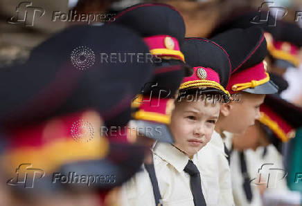 Young military cadets attend a ceremony to mark the start of the new school year in Kyiv