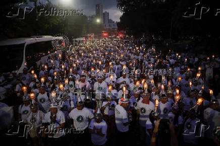 Demonstrators attend a march in defense of the living forest, territorial rights, and global climate responsibility during the U.N. Climate Change Conference (COP30) in Belem