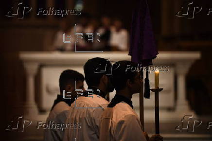 Worshippers participate in Stations of the Cross at St Mary’s Catholic Cathedral in Sydney