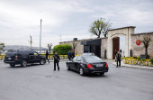 Vehicles arrive at the Turkish Presidency's Dolmabahce working office, in Istanbul
