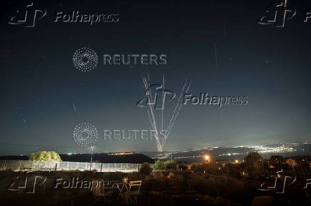 Missiles launched from Iran are intercepted as seen from the Israeli-occupied Golan Heights