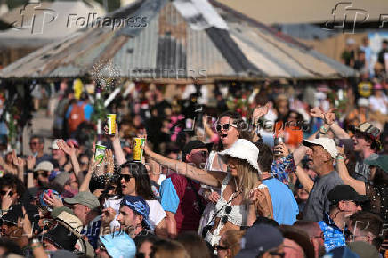 Revellers attend Glastonbury Festival at Worthy Farm in Pilton, Somerset, Britain