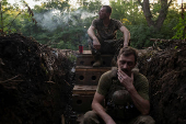 Ukrainian servicemen rest at a position on a front line near the city of Kostiantynivka