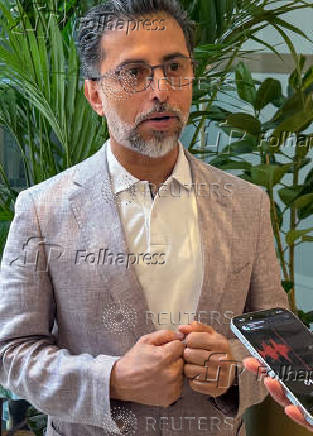 United Arab Emirates' Minister of Energy Suhail Mohamed Al Mazrouei speaks with reporters in Vienna