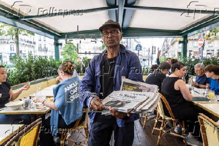 The last Newspaper Hawker in Paris to receive Order of Merit from President Macron