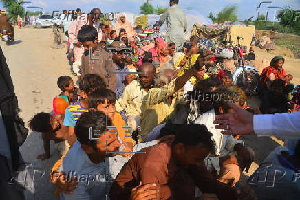 Thousands are evacuated as floods devastate parts of Punjab province