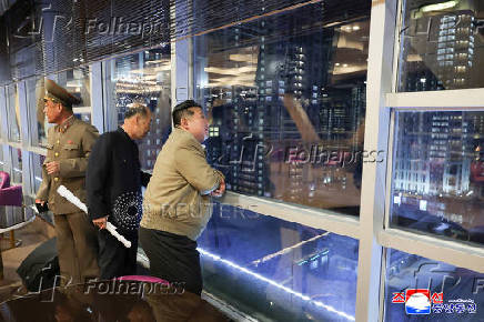 North Korean leader Kim Jong Un inspects the preparations for the operating of service facilities built in the Hwasong area in Pyongyang