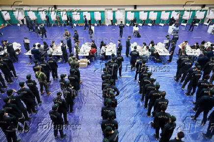 People cast early votes for the upcoming presidential election