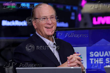 Larry Fink, Chairman and CEO of BlackRock, speaks during an interview with CNBC on the floor at the NYSE in New York