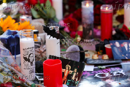 Flowers and pictures are placed on the star of late Ozzy Osbourne at the Hollywood Walk of Fame in Los Angeles