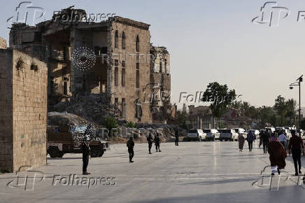 Syria?s interim President Ahmed al-Sharaa attends the ?Aleppo, Key to Victory? celebration  in Aleppo