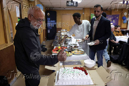 Khizra Mosque hosts a lunch as part of its Eid al-Adha celebrations, in Manchester