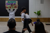 Families of victims of extra-judicial killings dramatize their experience through theater program