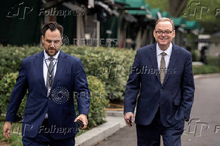 White House economic adviser Hassett walks outside the White House in Washington