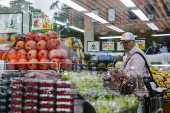 A person shops for groceries in New York City