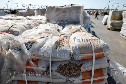 Humanitarian aid is waited to be transferred into Gaza from Israel, at the Gaza part of the Kerem Shalom crossing in the Gaza Strip