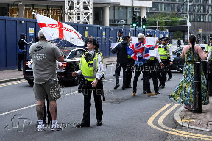 Anti-immigration protest outside the Britannia International Hotel, in Canary Wharf