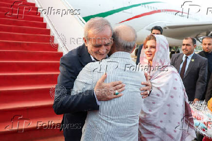 Iranian President Pezeshkian is welcomed by Pakistani PM Sharif in Islamabad