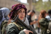 Syrian Democratic Forces (SDF) fighters convoy leaves Aleppo