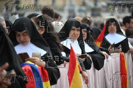 Pope Leone XIV leads Regina Caeli prayer from the Central Loggia of St. Peter's Basilica